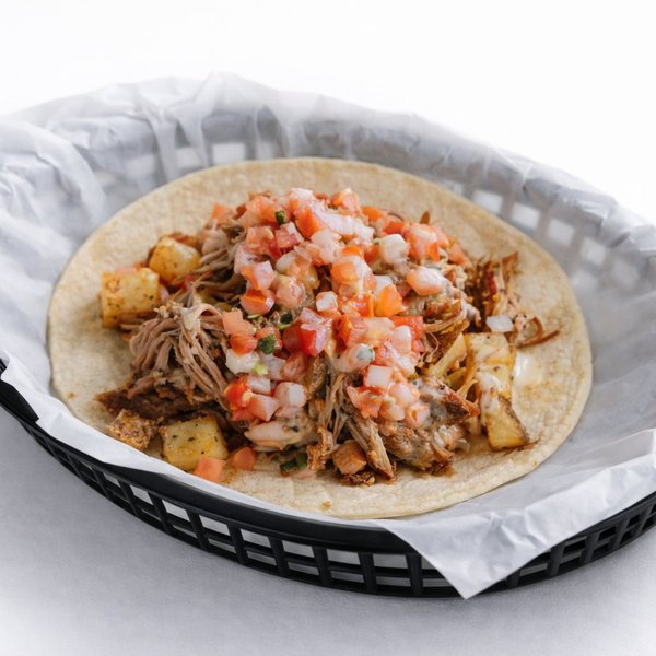 Pork carnitas taco Austin — Kesos Tacos