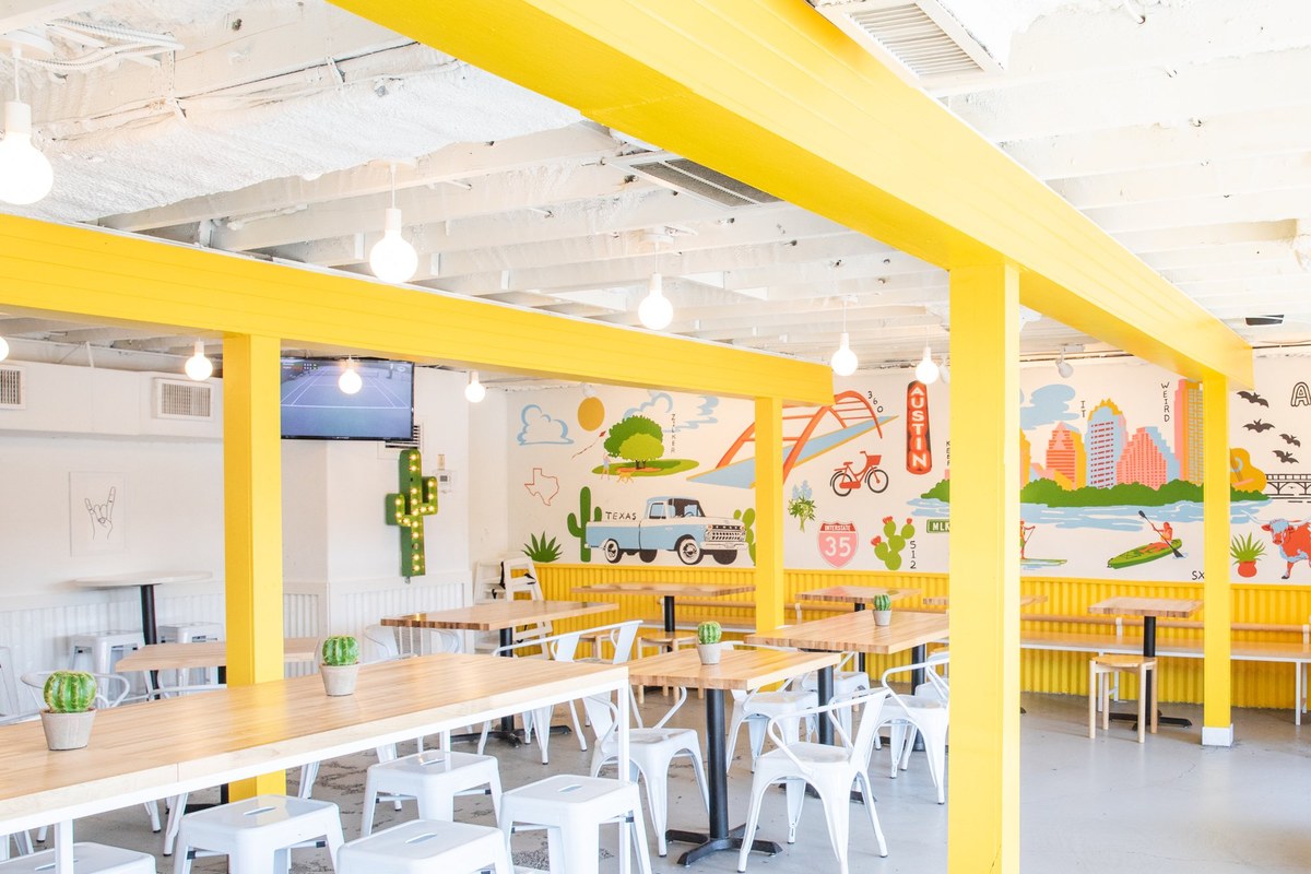 Kesos Tacos Austin dining room with mural
